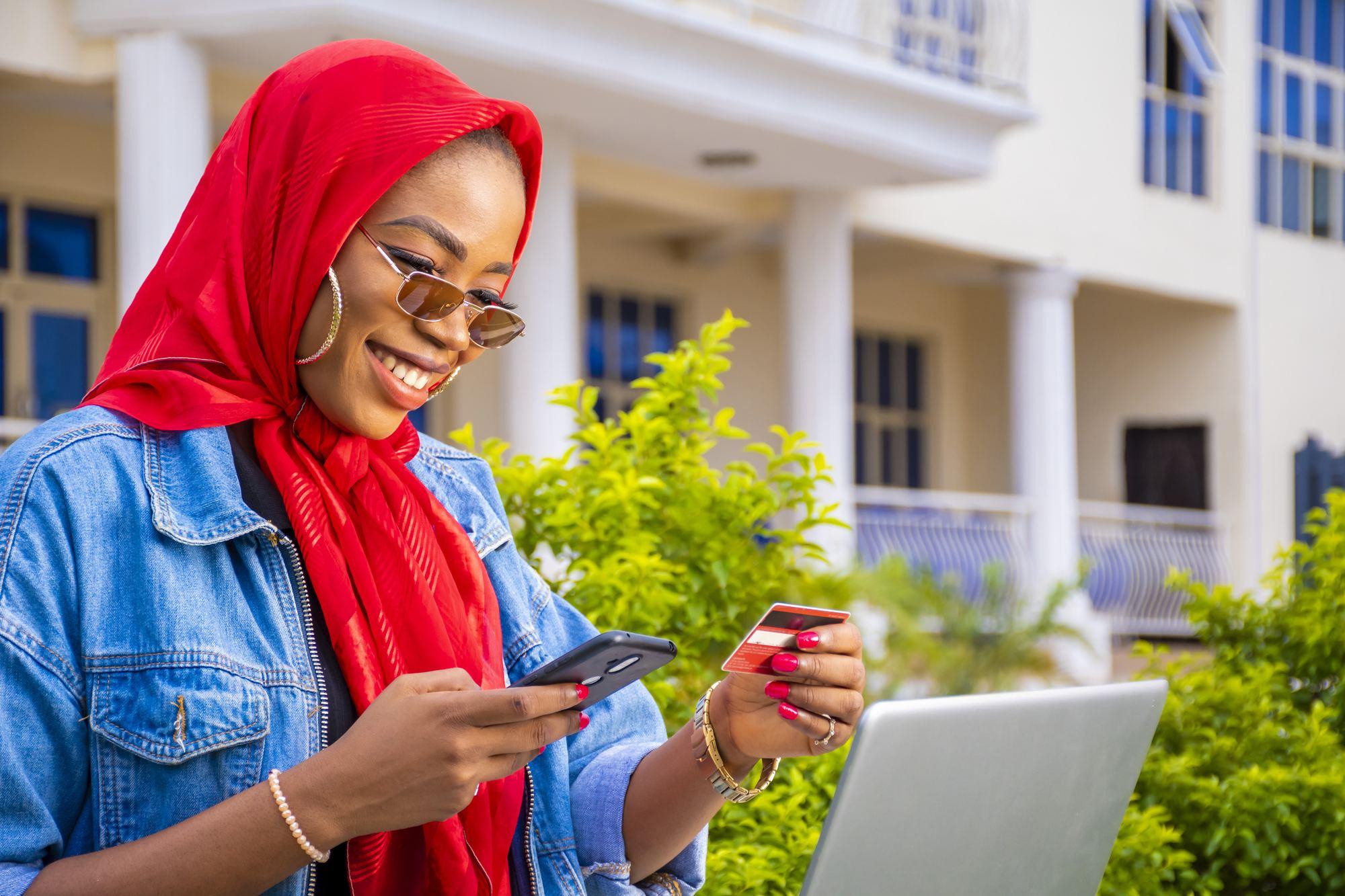 A Routelink MFB customer on her phone